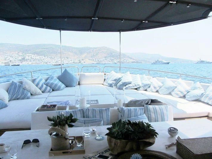 a table with a plant on it aboard LUTTEUR Yacht for Sale