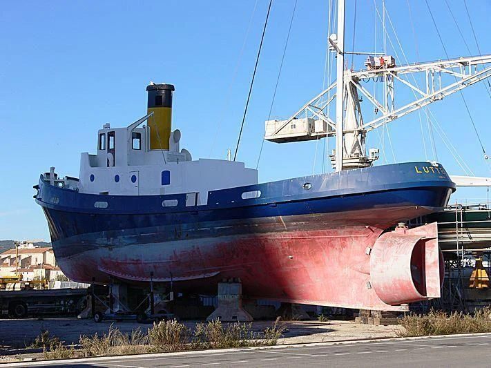 a large blue and white boat aboard LUTTEUR Yacht for Sale