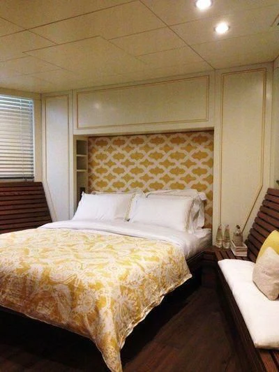 a bed in a room aboard LUTTEUR Yacht for Sale