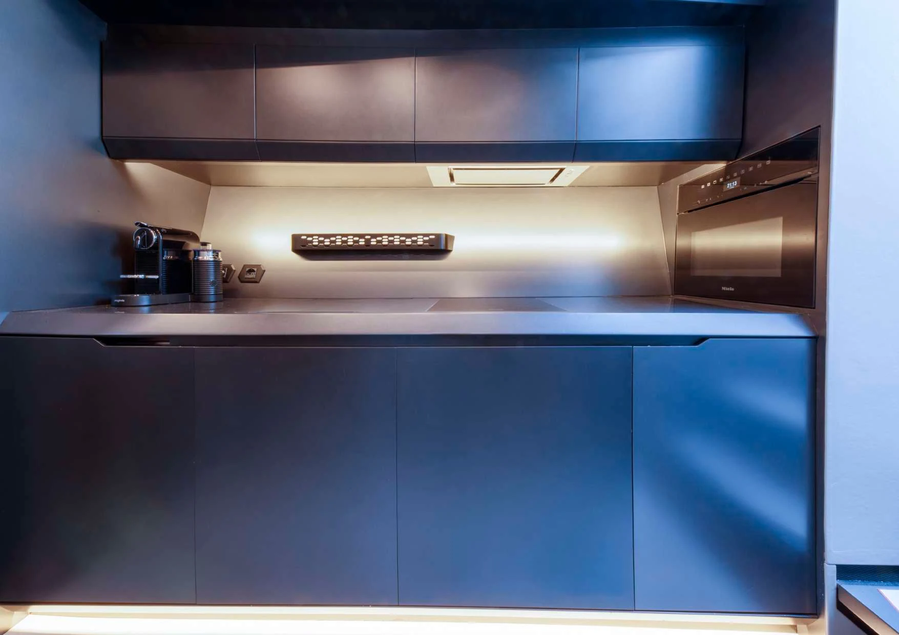 a machine on the counter aboard FAST ONE Yacht for Charter