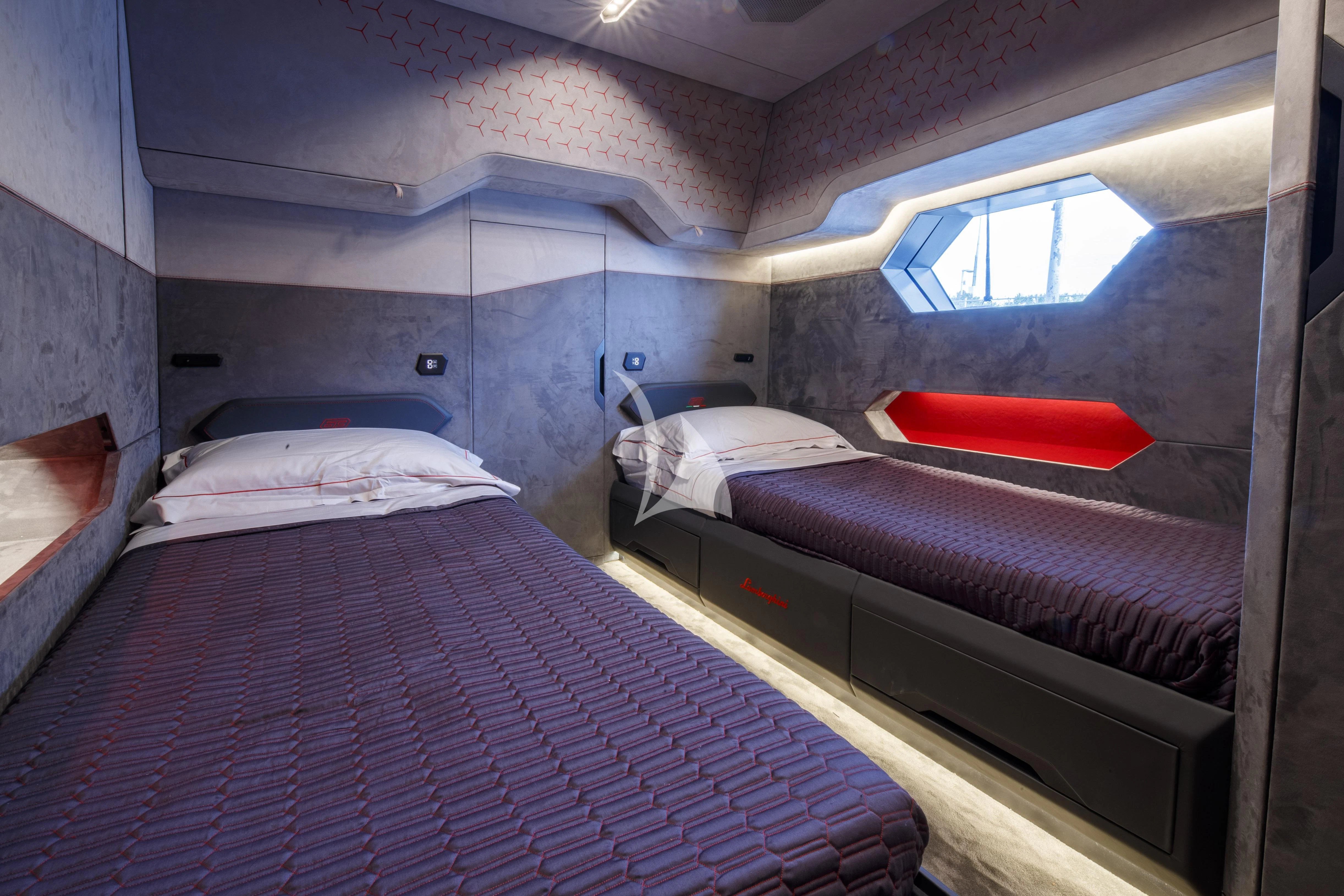 a couple of beds in a room aboard FAST ONE Yacht for Charter