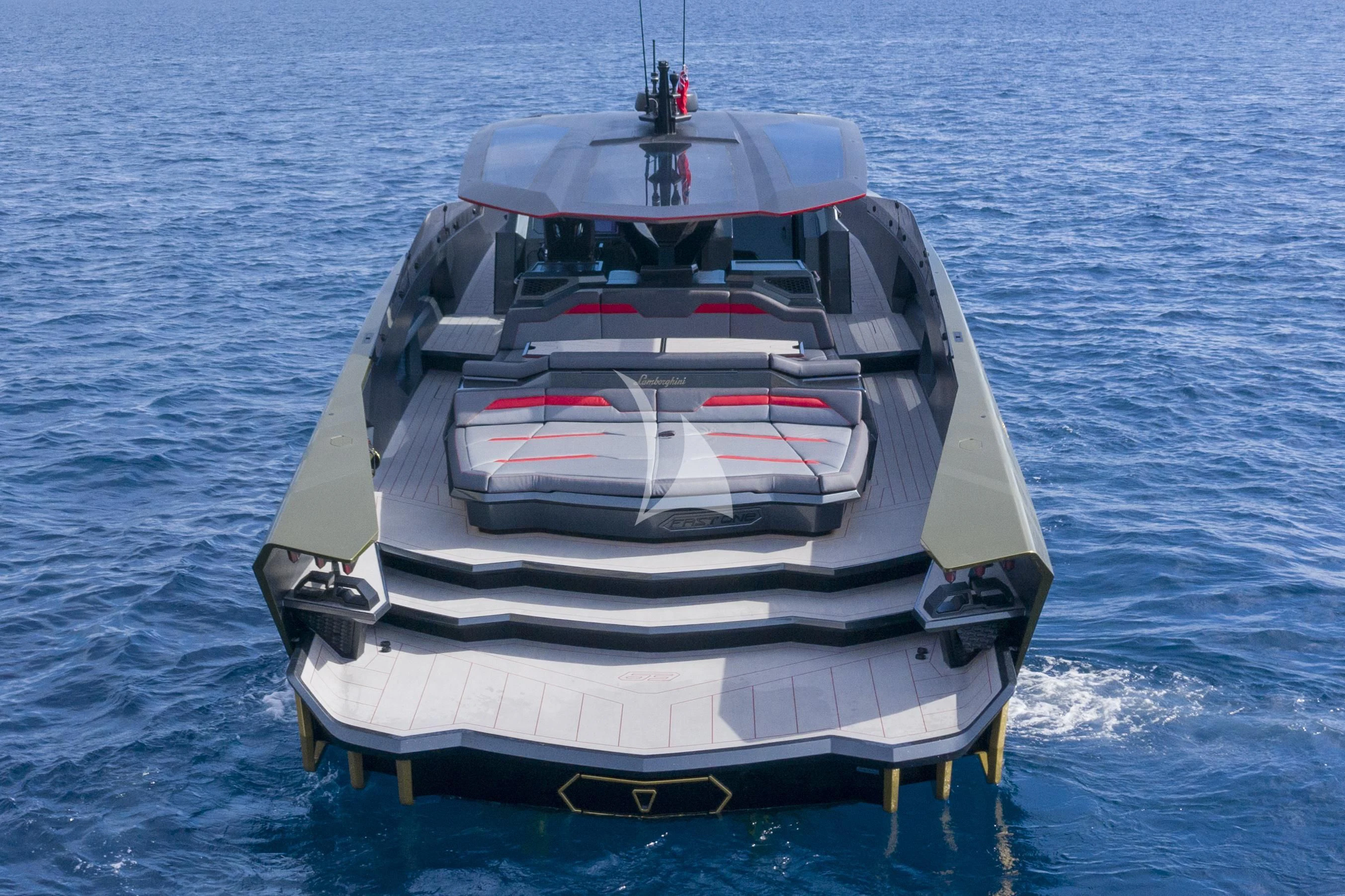 a boat with a striped stripe aboard FAST ONE Yacht for Charter