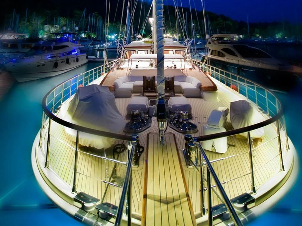a boat docked at a pier aboard DAIMA Yacht for Sale