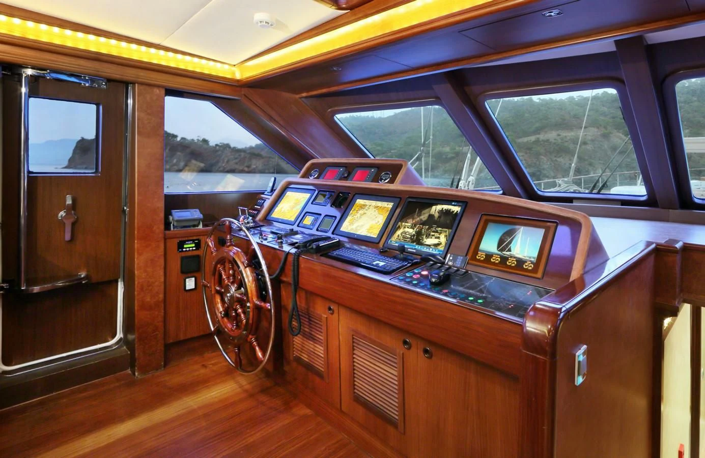 inside of a vehicle with a large window and a door open aboard DAIMA Yacht for Sale