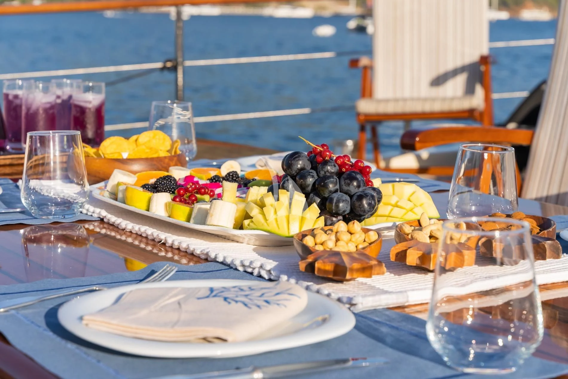 a table with food on it aboard DAIMA Yacht for Sale