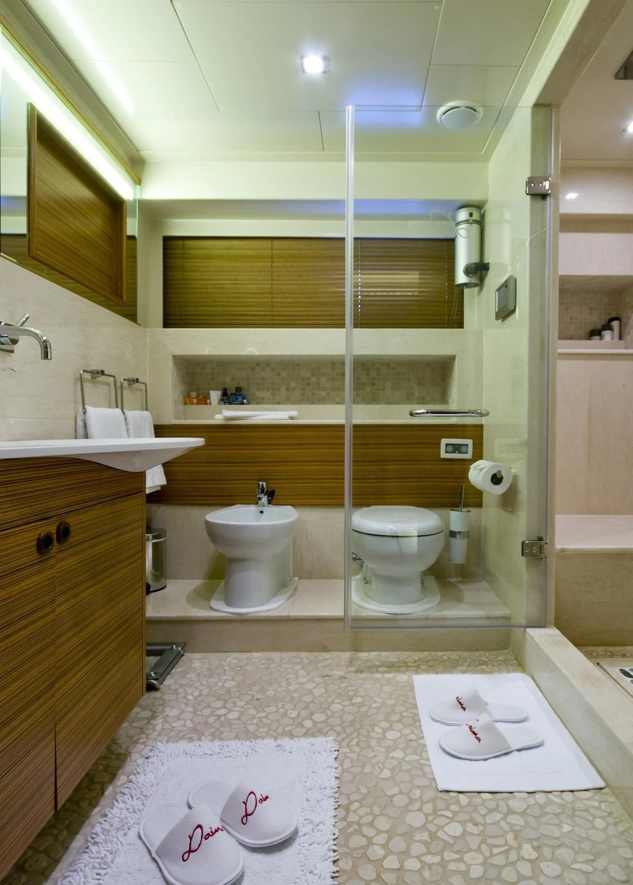 a bathroom with a toilet sink and a bathtub aboard DAIMA Yacht for Sale