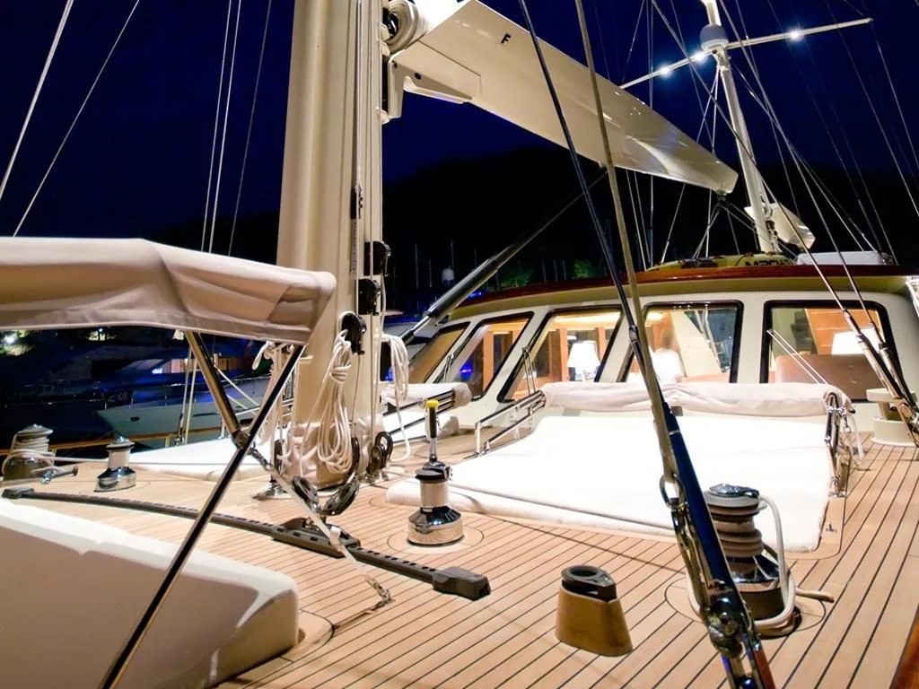 a glass table with a glass display aboard DAIMA Yacht for Sale