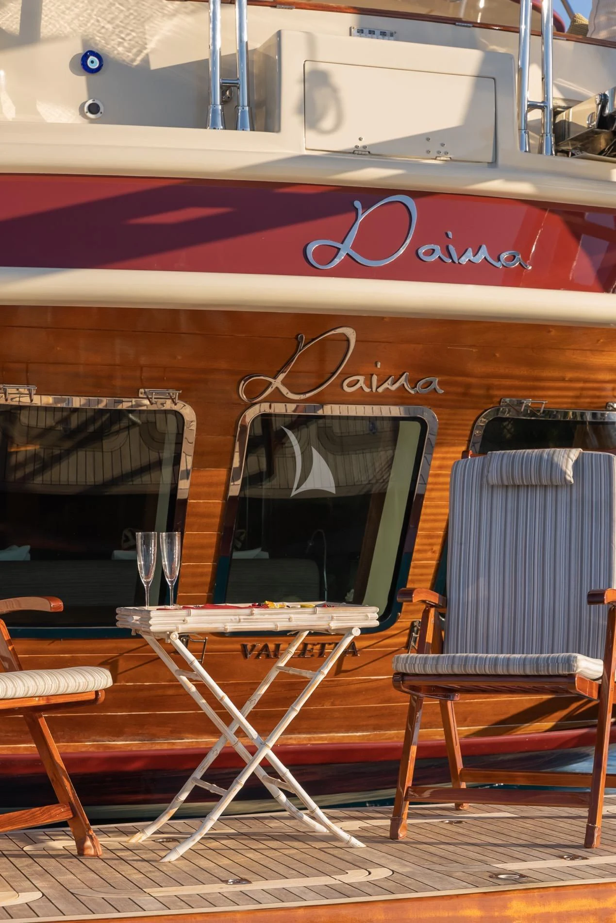 a boat with a bench aboard DAIMA Yacht for Sale