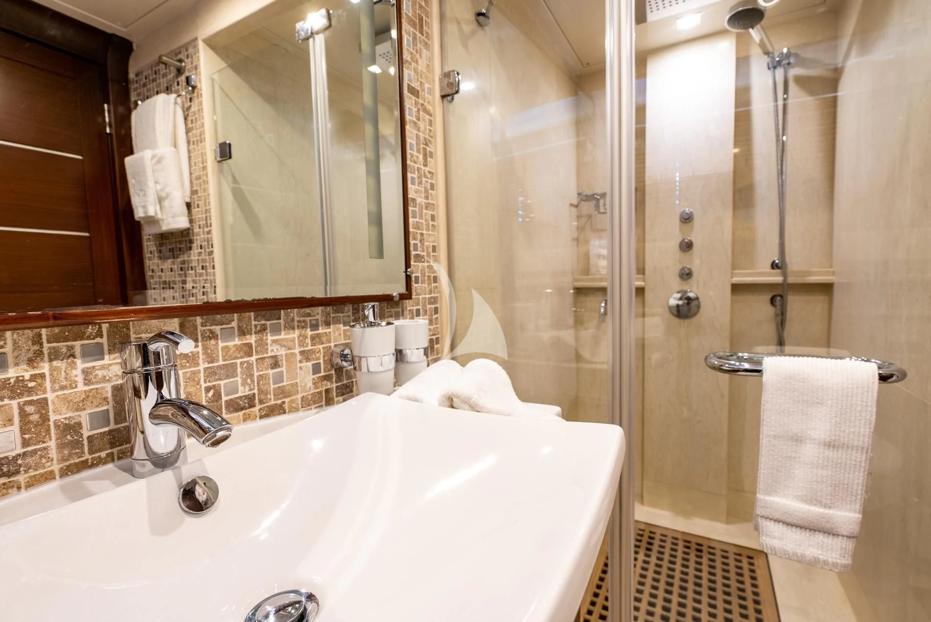 a bathroom with a bathtub and sink aboard DAIMA Yacht for Sale