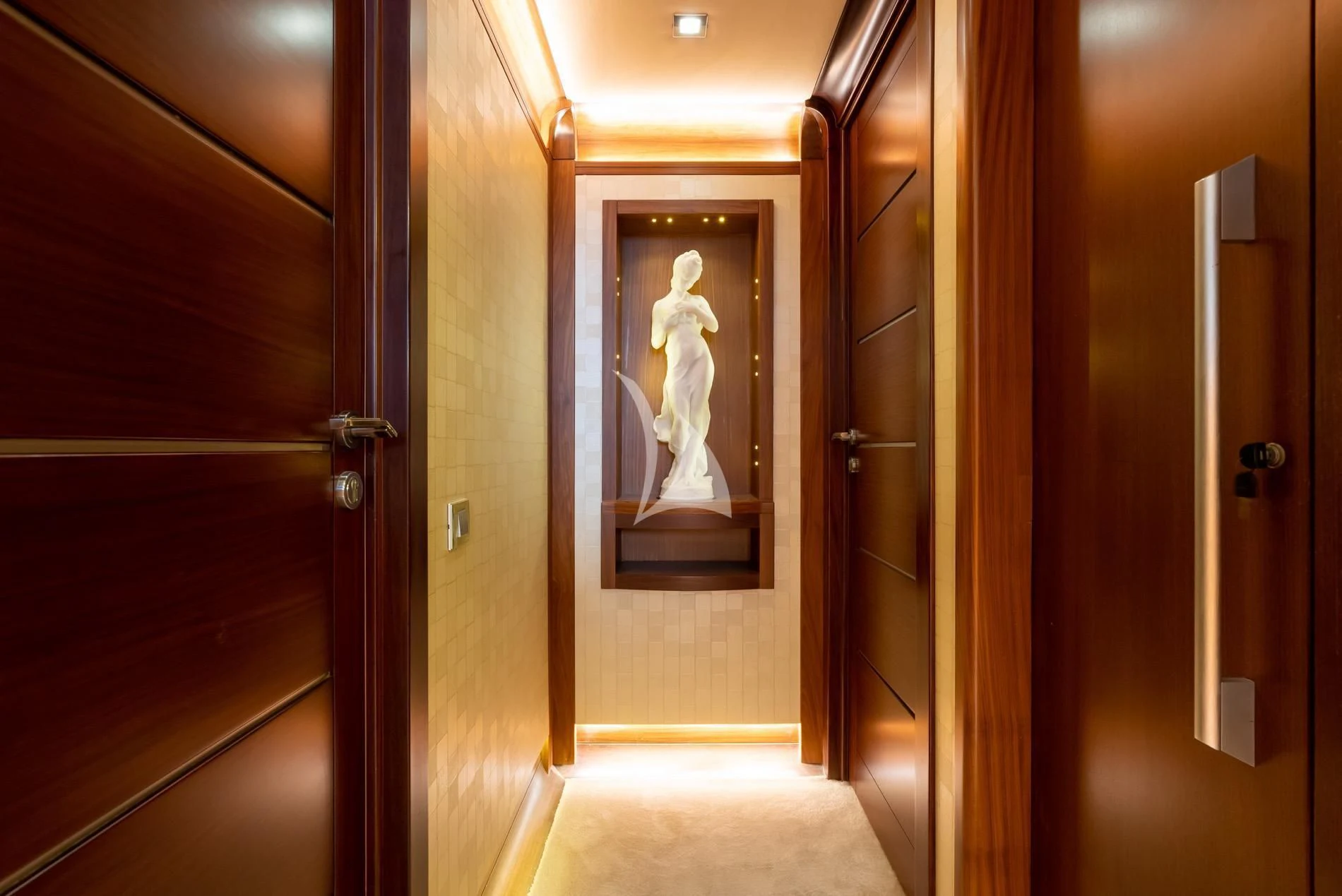 a door with a painting on it aboard DAIMA Yacht for Sale