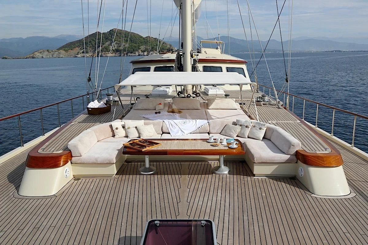 a boat on a deck aboard DAIMA Yacht for Sale