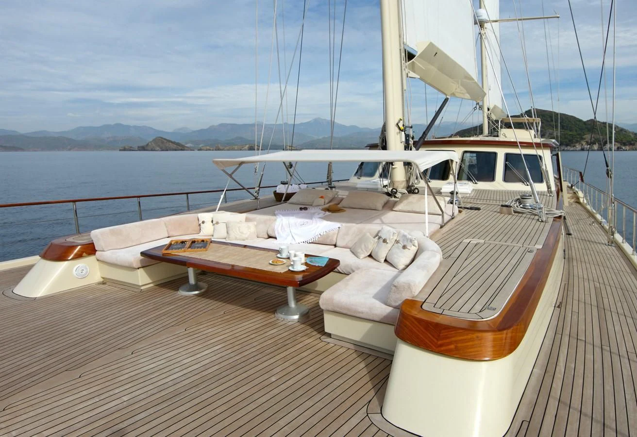 a boat on a deck aboard DAIMA Yacht for Sale
