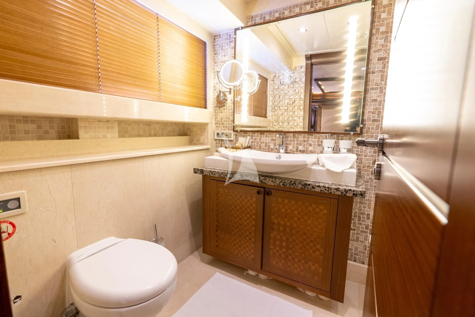 a bathroom with a sink and a toilet aboard DAIMA Yacht for Sale