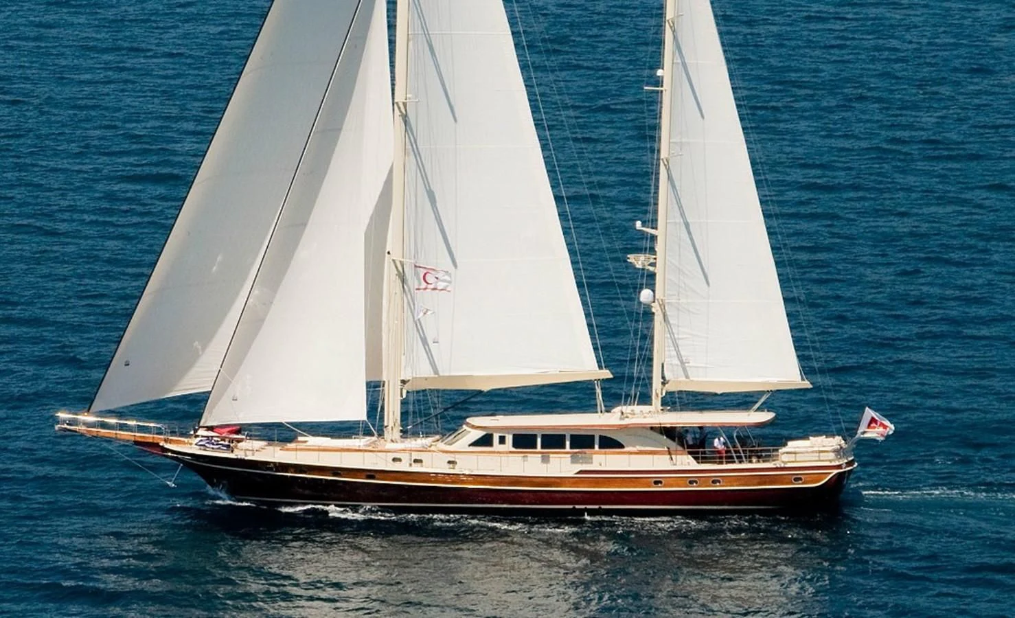 a sailboat on the water aboard DAIMA Yacht for Sale