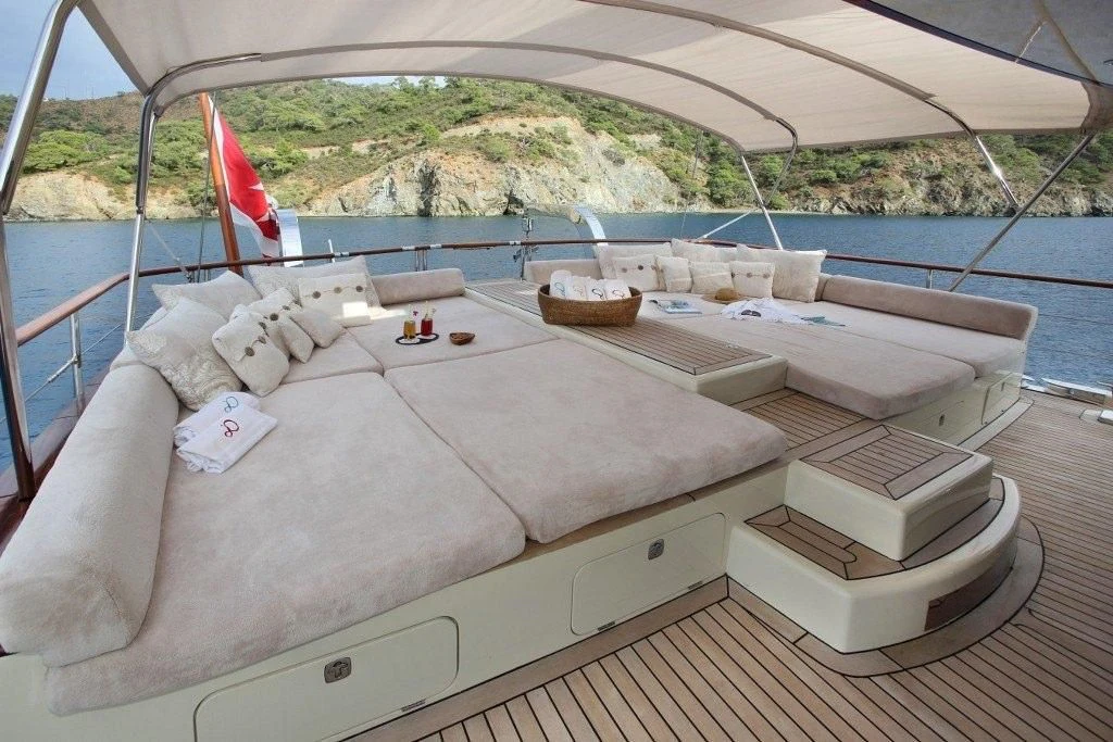 a bed on a boat aboard DAIMA Yacht for Sale