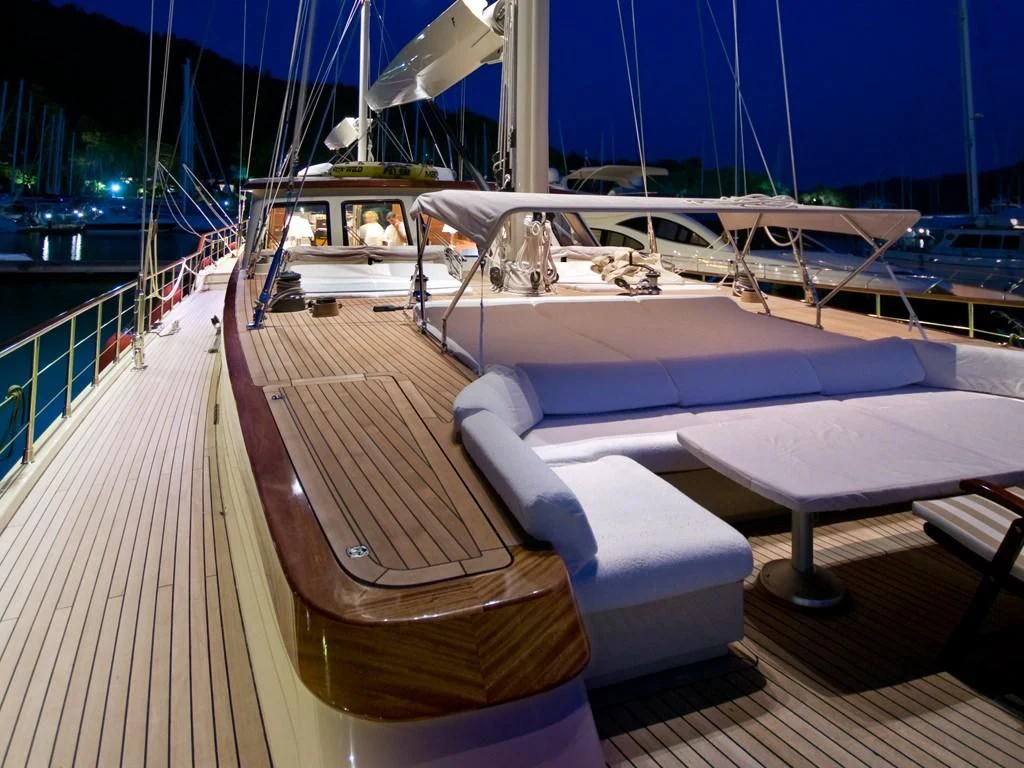 a boat on a deck aboard DAIMA Yacht for Sale
