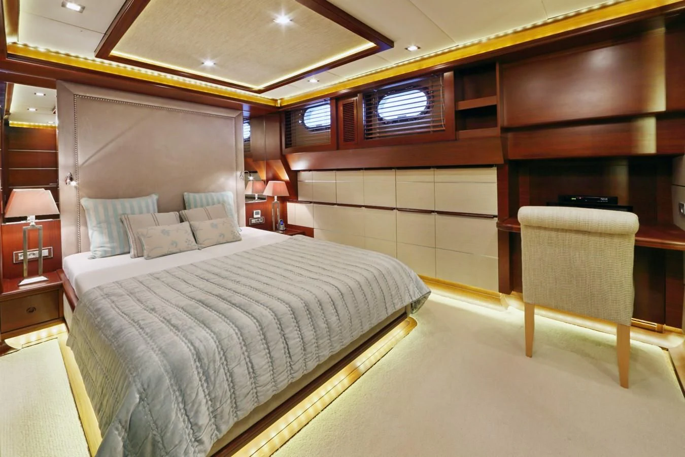 a room with two beds aboard DAIMA Yacht for Sale