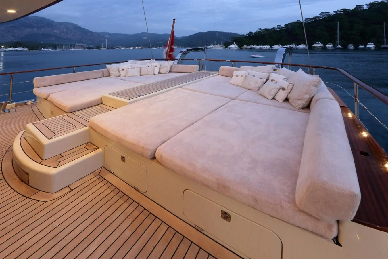 a boat on a deck aboard DAIMA Yacht for Sale