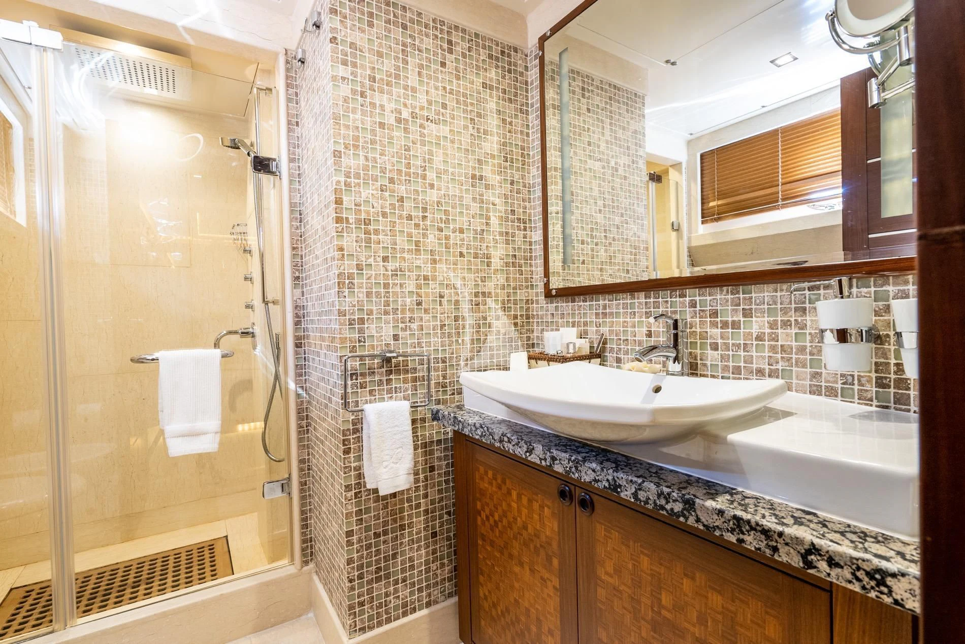 a bathroom with a sink and a shower aboard DAIMA Yacht for Sale