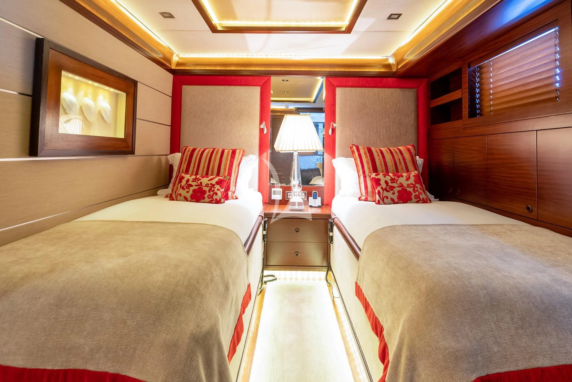 a room with two beds aboard DAIMA Yacht for Sale