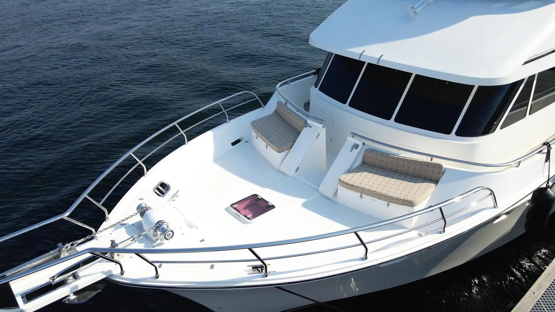 a white boat on the water aboard SEA CZAR Yacht for Sale