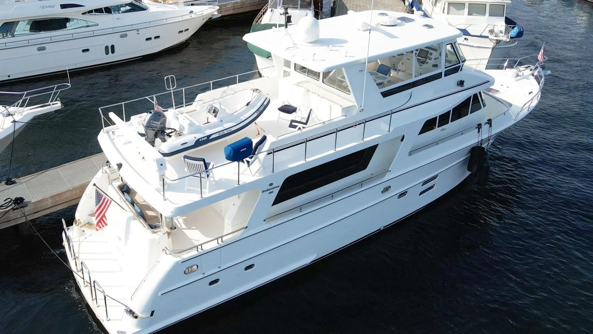 a white boat in the water aboard SEA CZAR Yacht for Sale