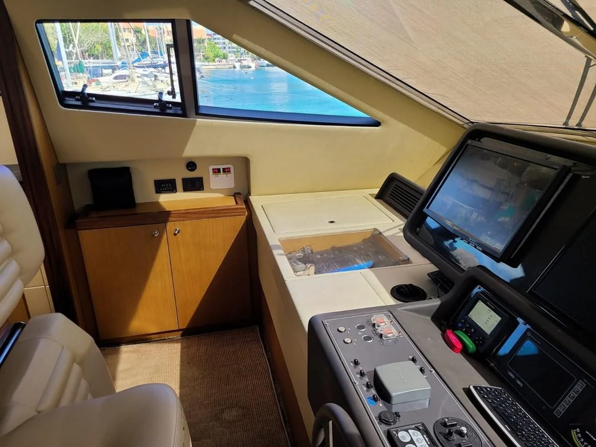 a room with a desk and a computer aboard SEDROP - 2006 FERRETTI 731 @ PTO. AVENTURAS Yacht for Sale