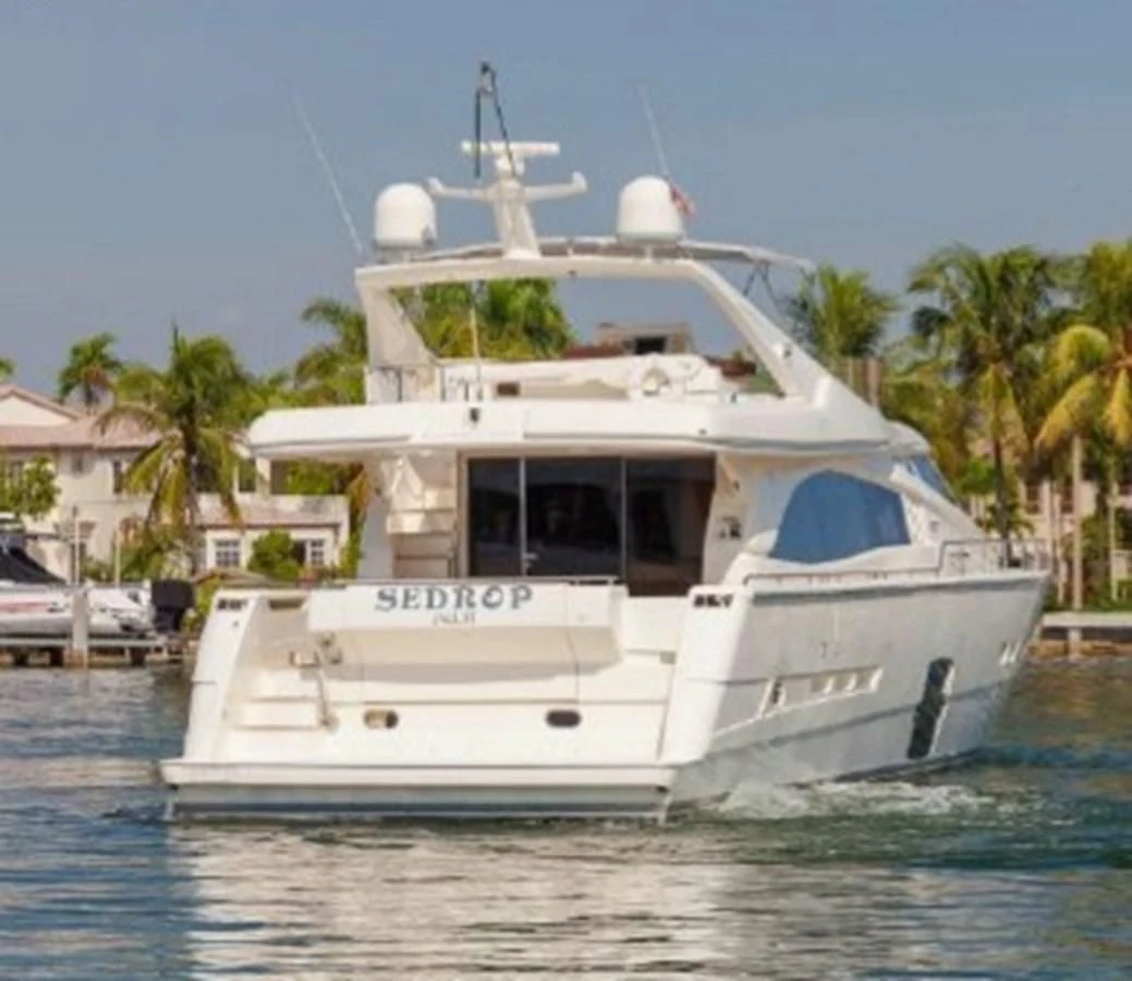 a white boat on the water aboard SEDROP - 2006 FERRETTI 731 @ PTO. AVENTURAS Yacht for Sale