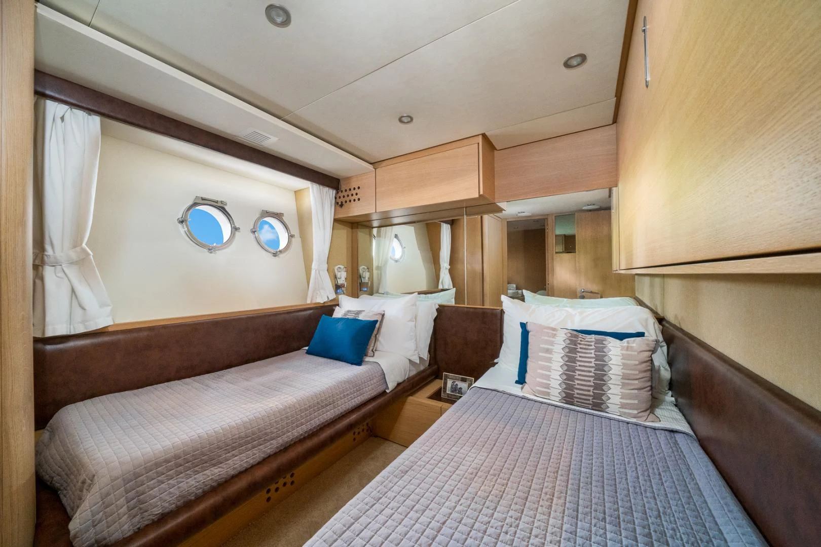 a room with two beds aboard SEA PEARL 2 Yacht for Sale