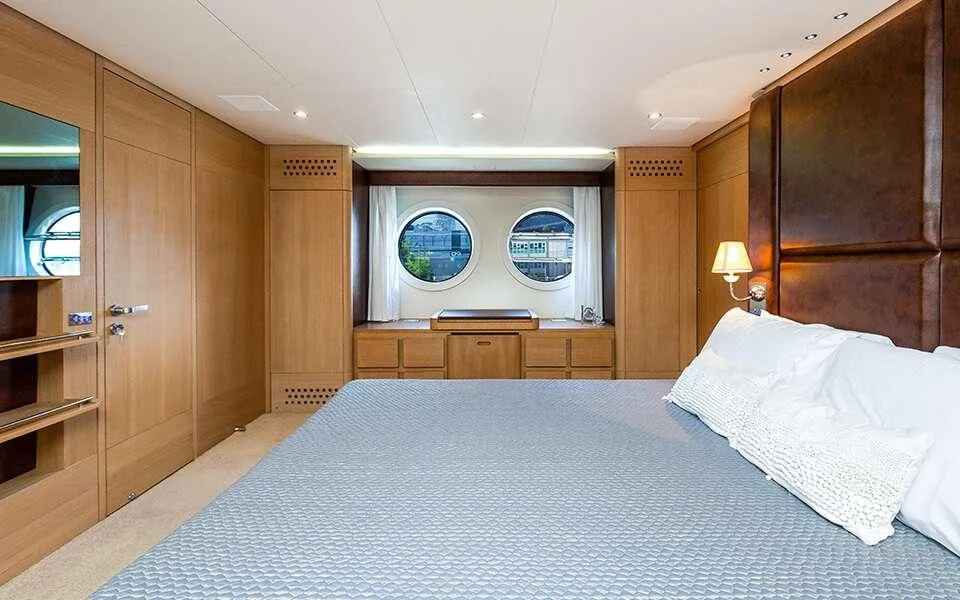 a bed in a room aboard SEA PEARL 2 Yacht for Sale
