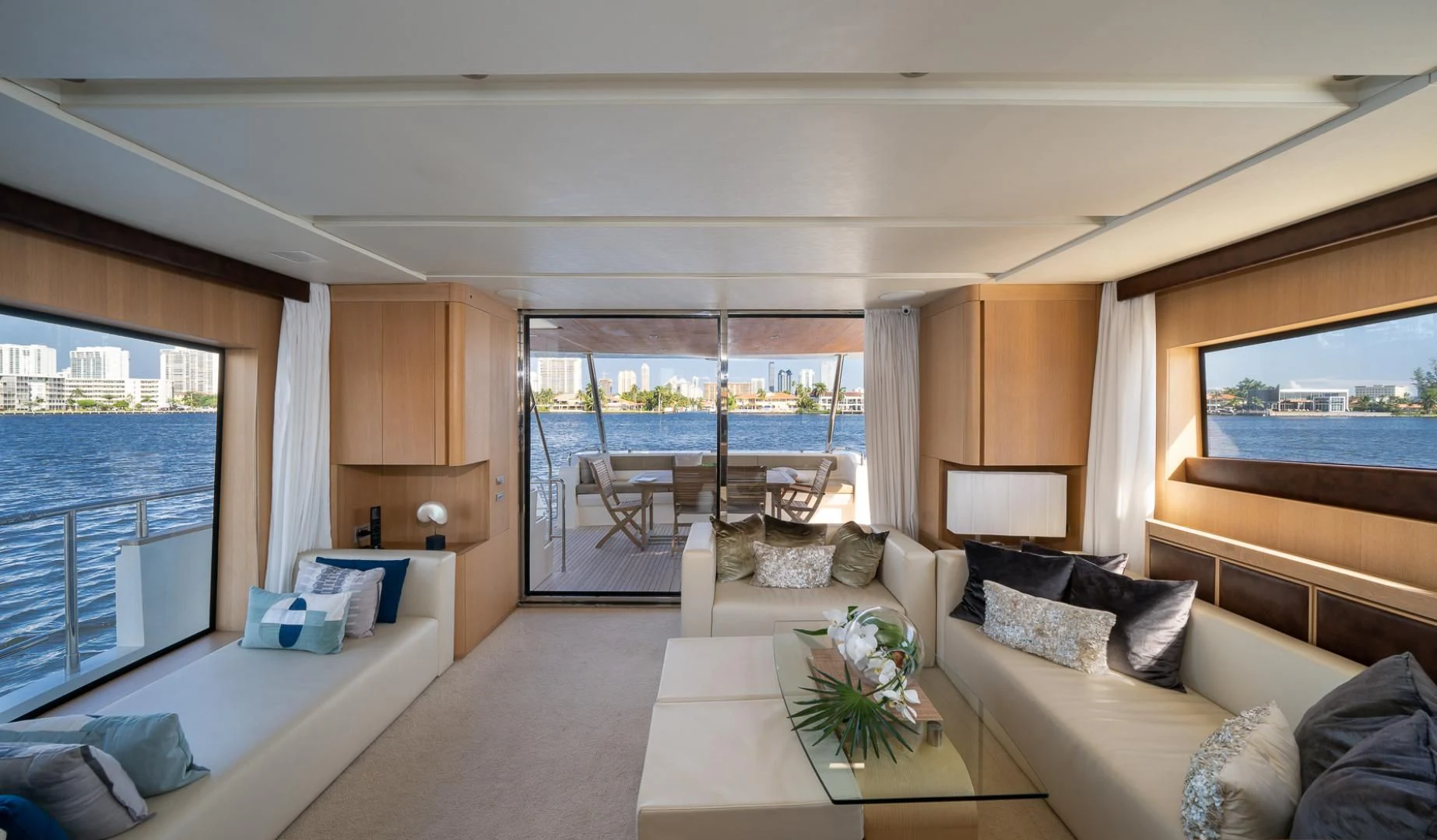a living room with a large window aboard SEA PEARL 2 Yacht for Sale