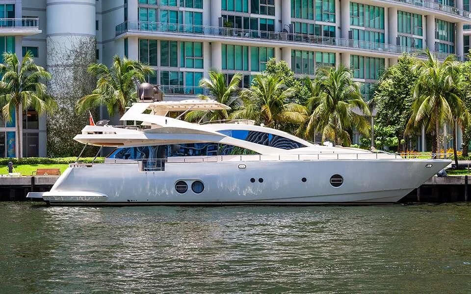 a white boat in a body of water aboard SEA PEARL 2 Yacht for Sale