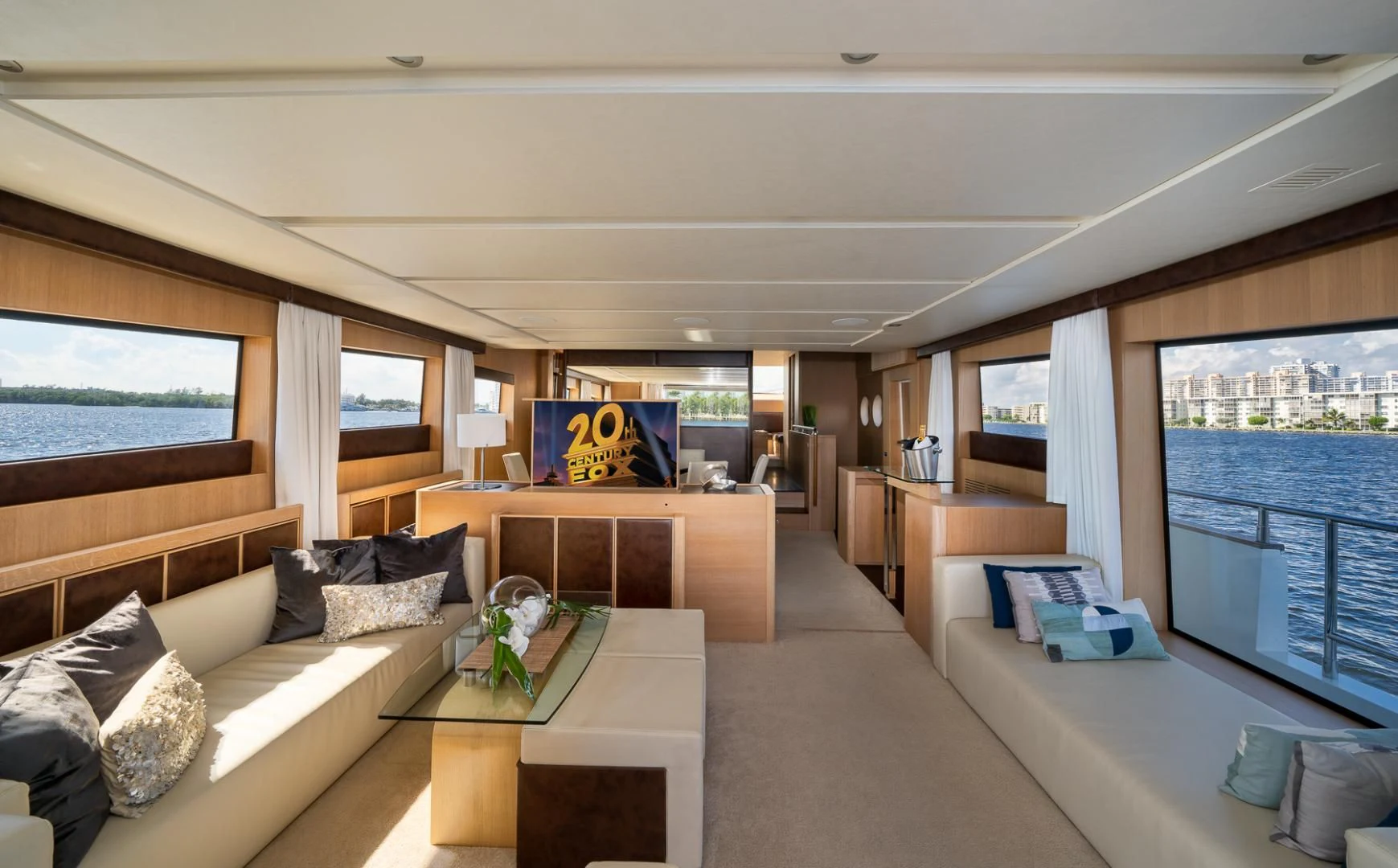 a living room with a large window aboard SEA PEARL 2 Yacht for Sale