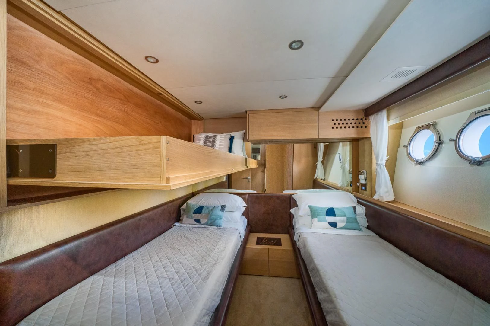 a room with bunk beds aboard SEA PEARL 2 Yacht for Sale