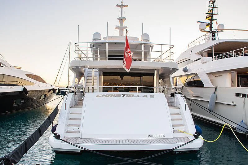 a boat docked at a pier aboard CHRISTELLA II Yacht for Sale