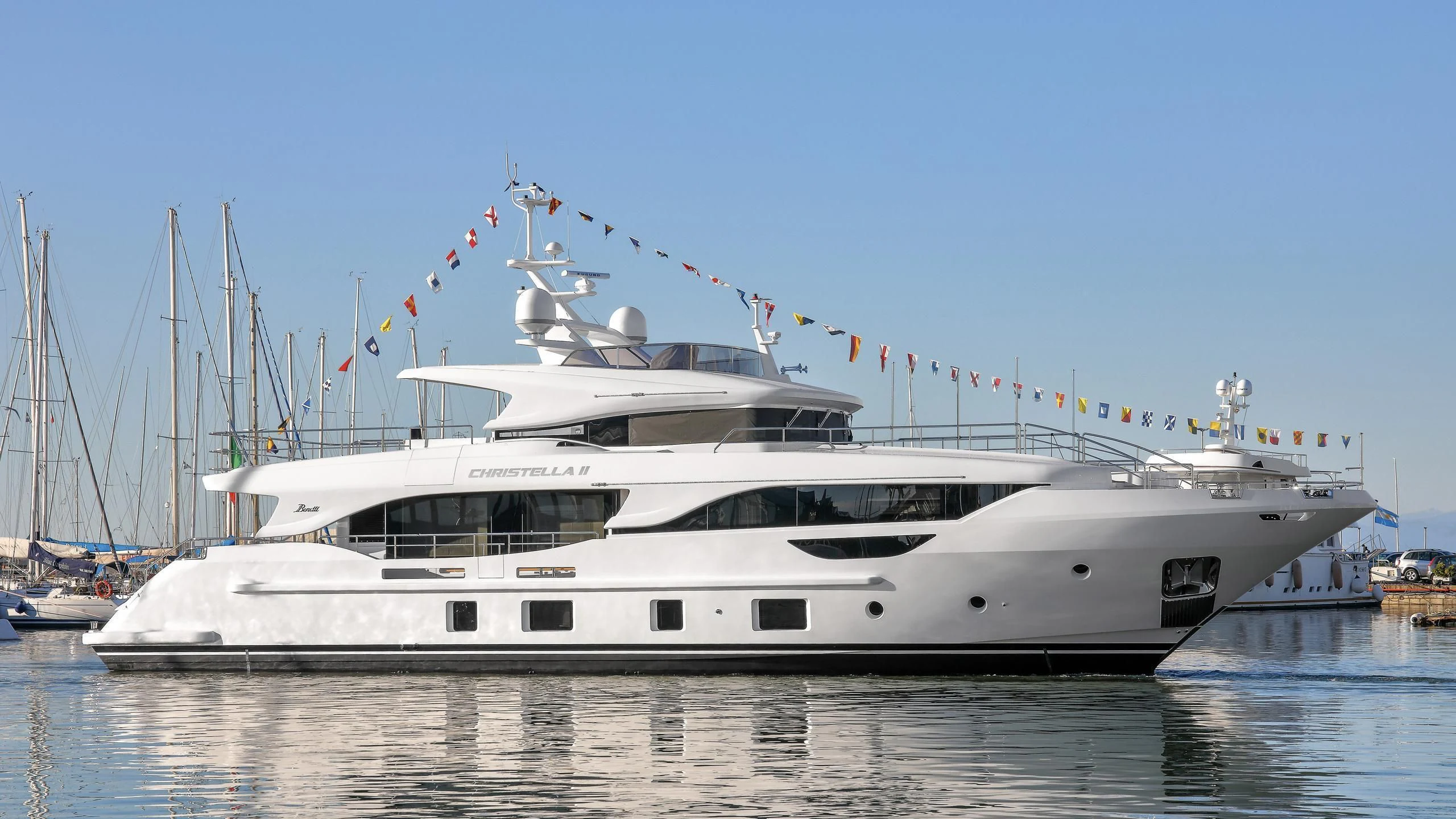 a white yacht in the water aboard CHRISTELLA II Yacht for Sale
