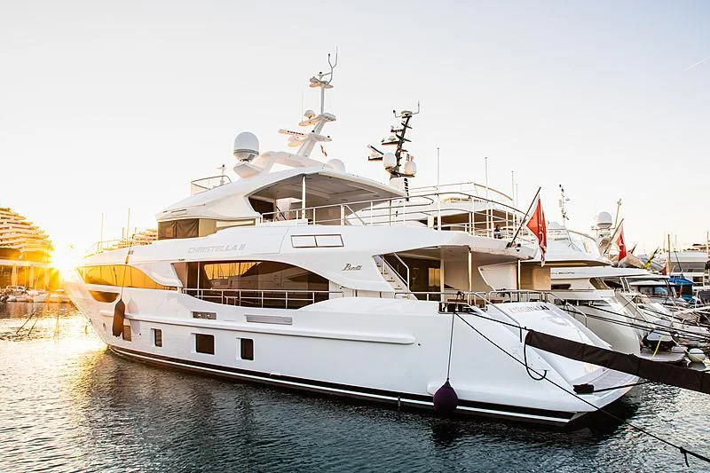 a large white boat on the water aboard CHRISTELLA II Yacht for Sale