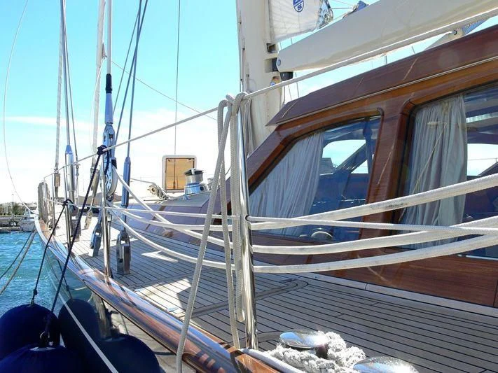 a boat with a large mirror aboard THALIA Yacht for Sale