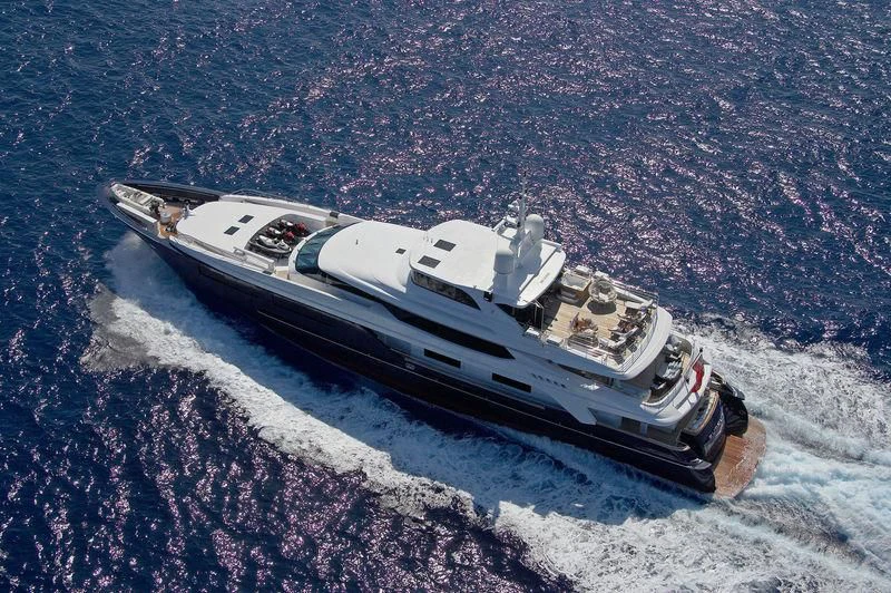 a car driving on a road aboard BURKUT Yacht for Sale