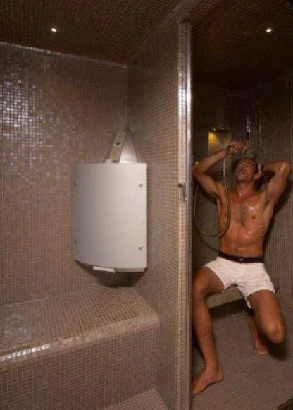 a man in a bathroom aboard BURKUT Yacht for Sale