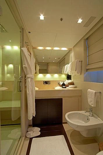 a bathroom with a sink and a shower aboard BURKUT Yacht for Sale