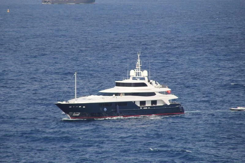 a large boat in the water aboard BURKUT Yacht for Sale