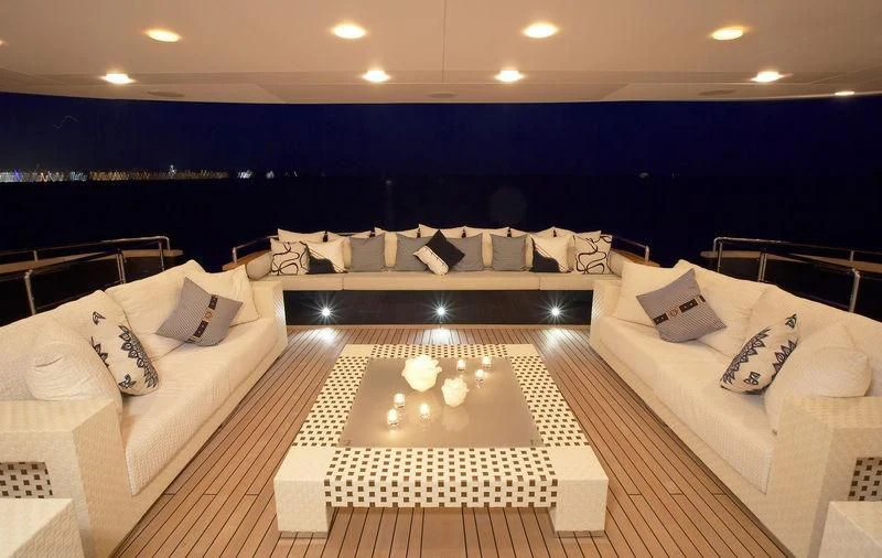 a room with a bed and a couch aboard BURKUT Yacht for Sale
