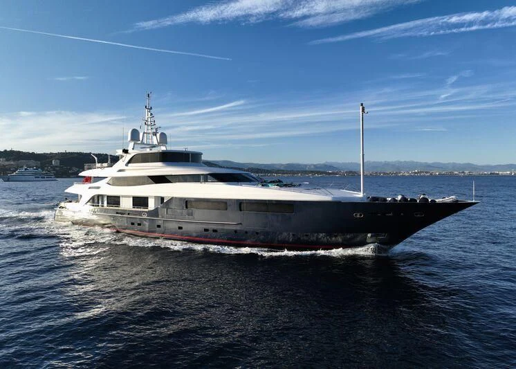 a large white boat in the water aboard BURKUT Yacht for Sale