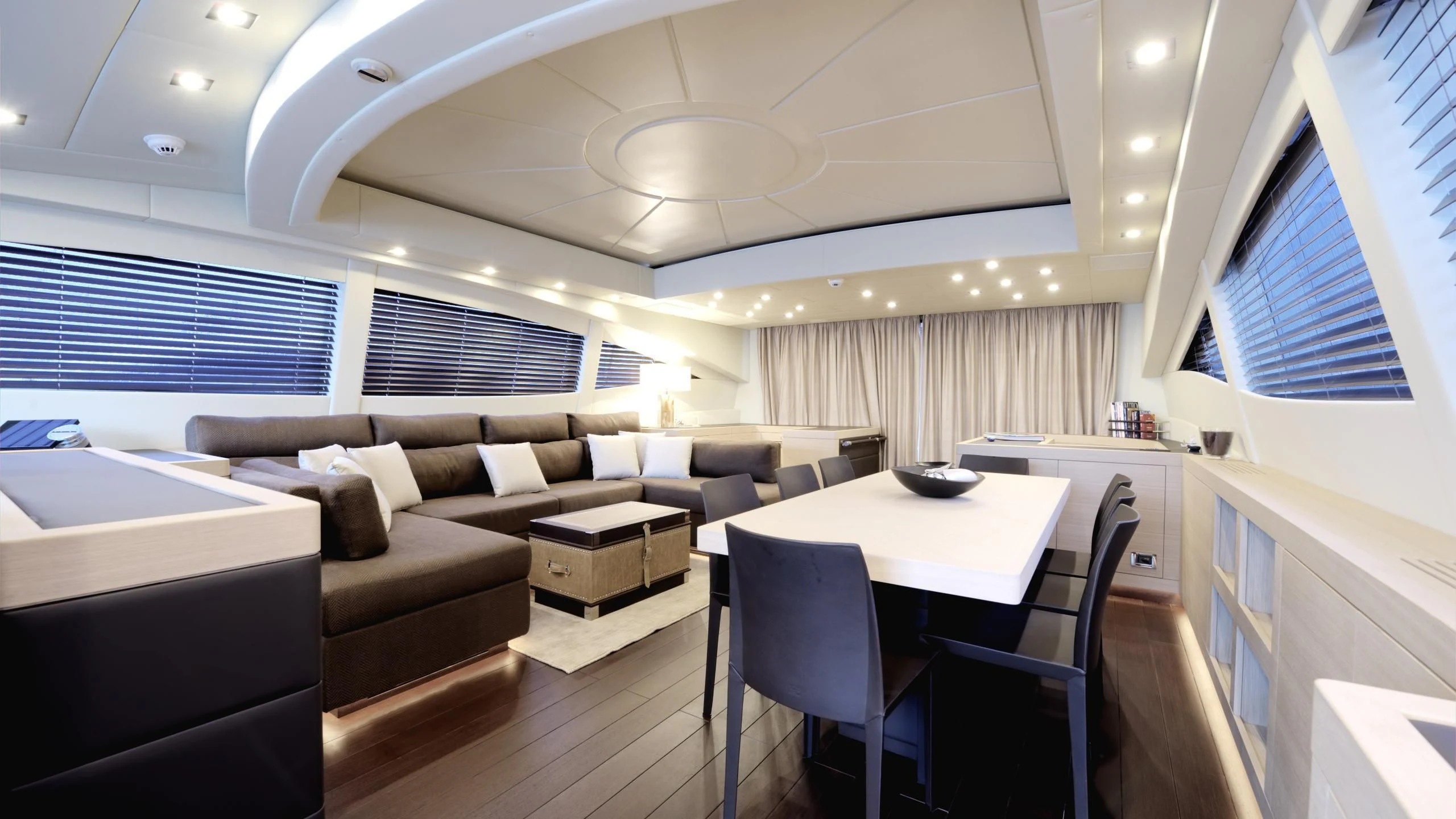 a room with a couch and a table and a couch aboard CLARISSA Yacht for Sale