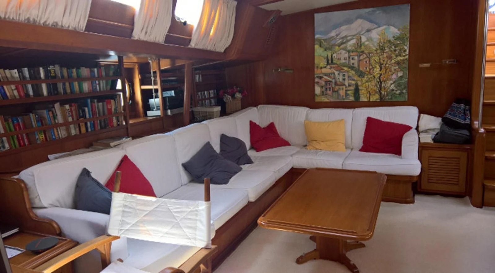 a living room with a couch and a coffee table aboard ACOA Yacht for Sale