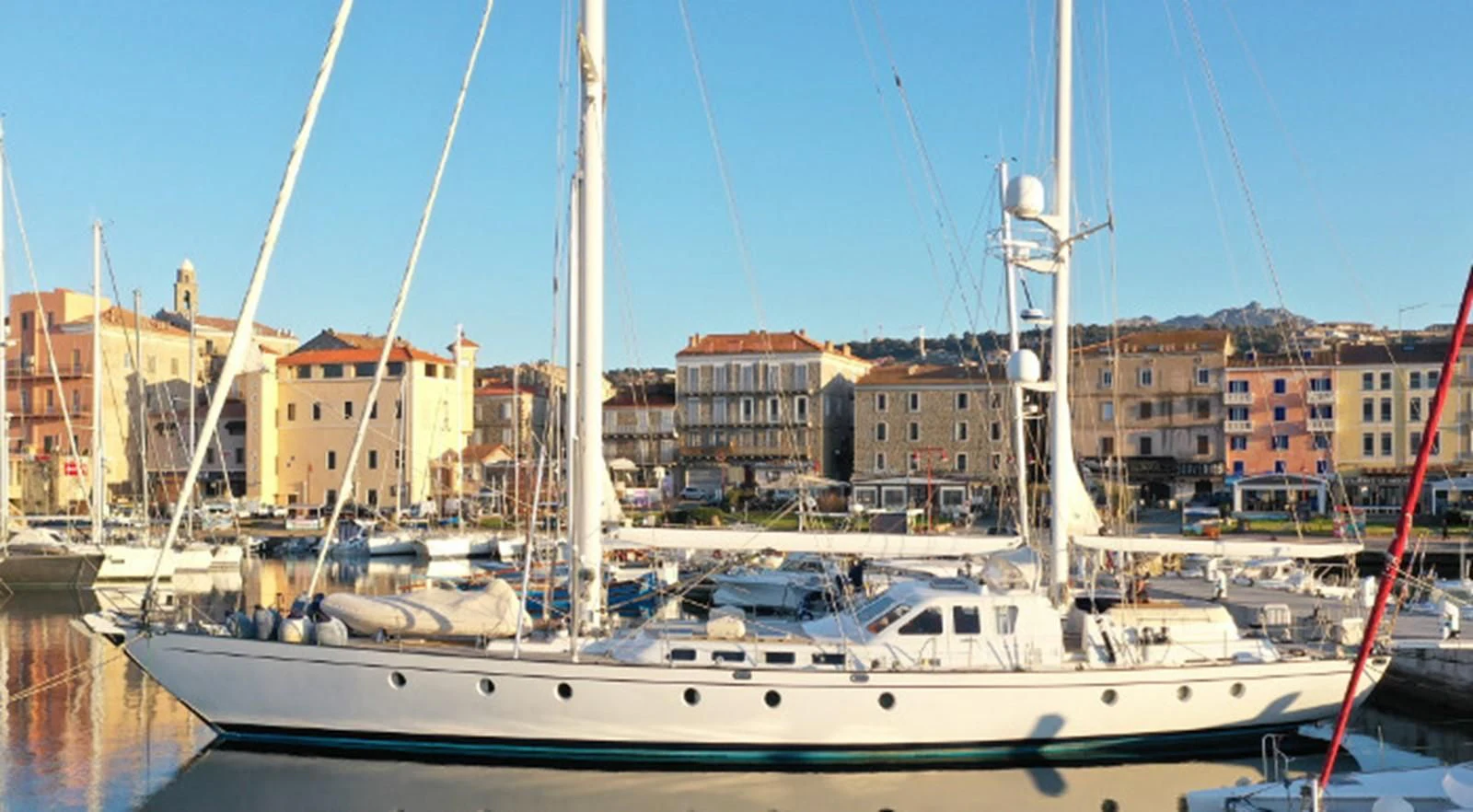 a boat in a harbor aboard ACOA Yacht for Sale