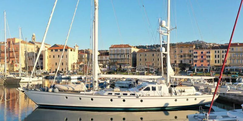 a boat docked in a harbor aboard ACOA Yacht for Sale