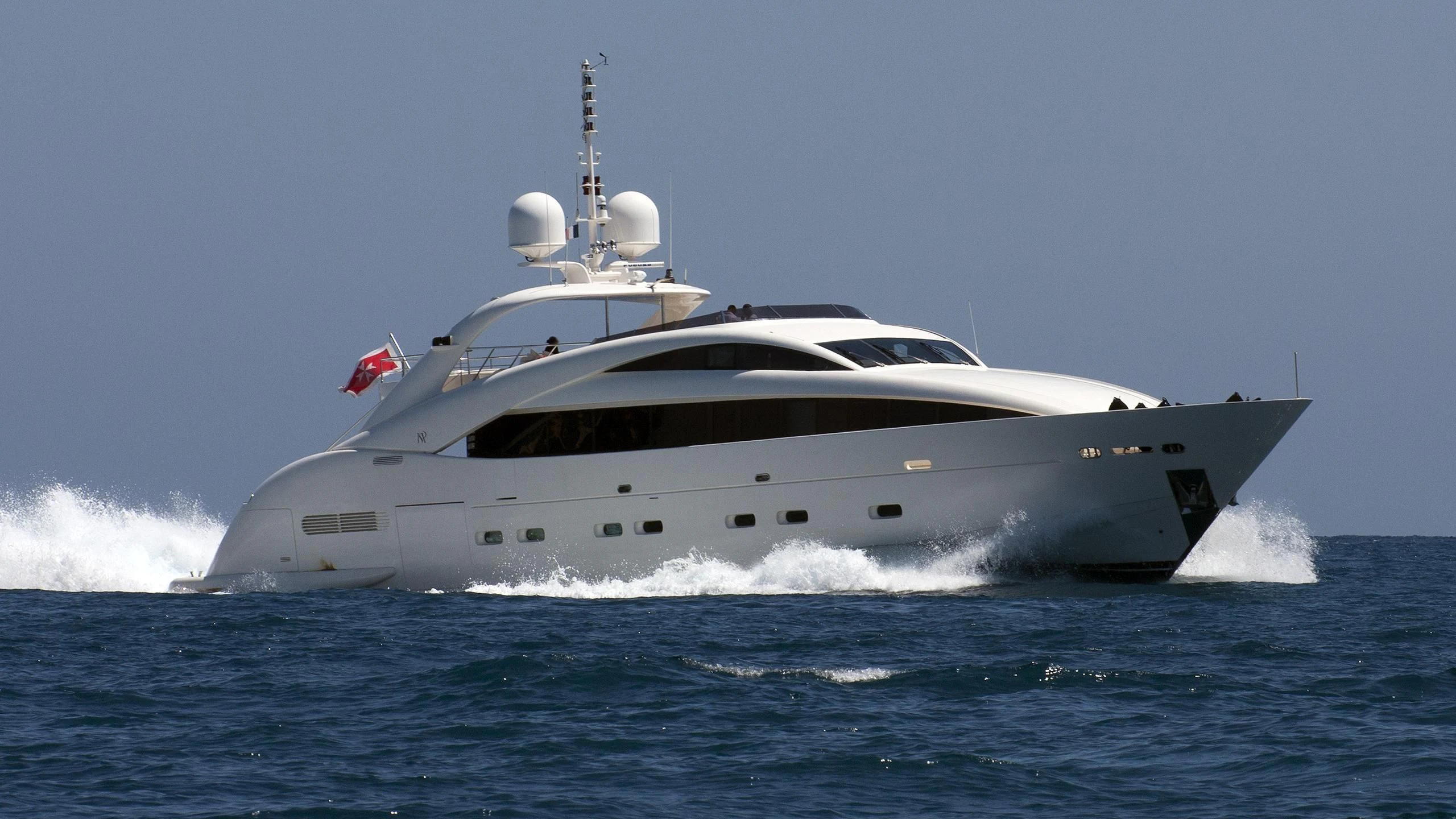 a white yacht on the water aboard WHISPERING ANGEL Yacht for Sale