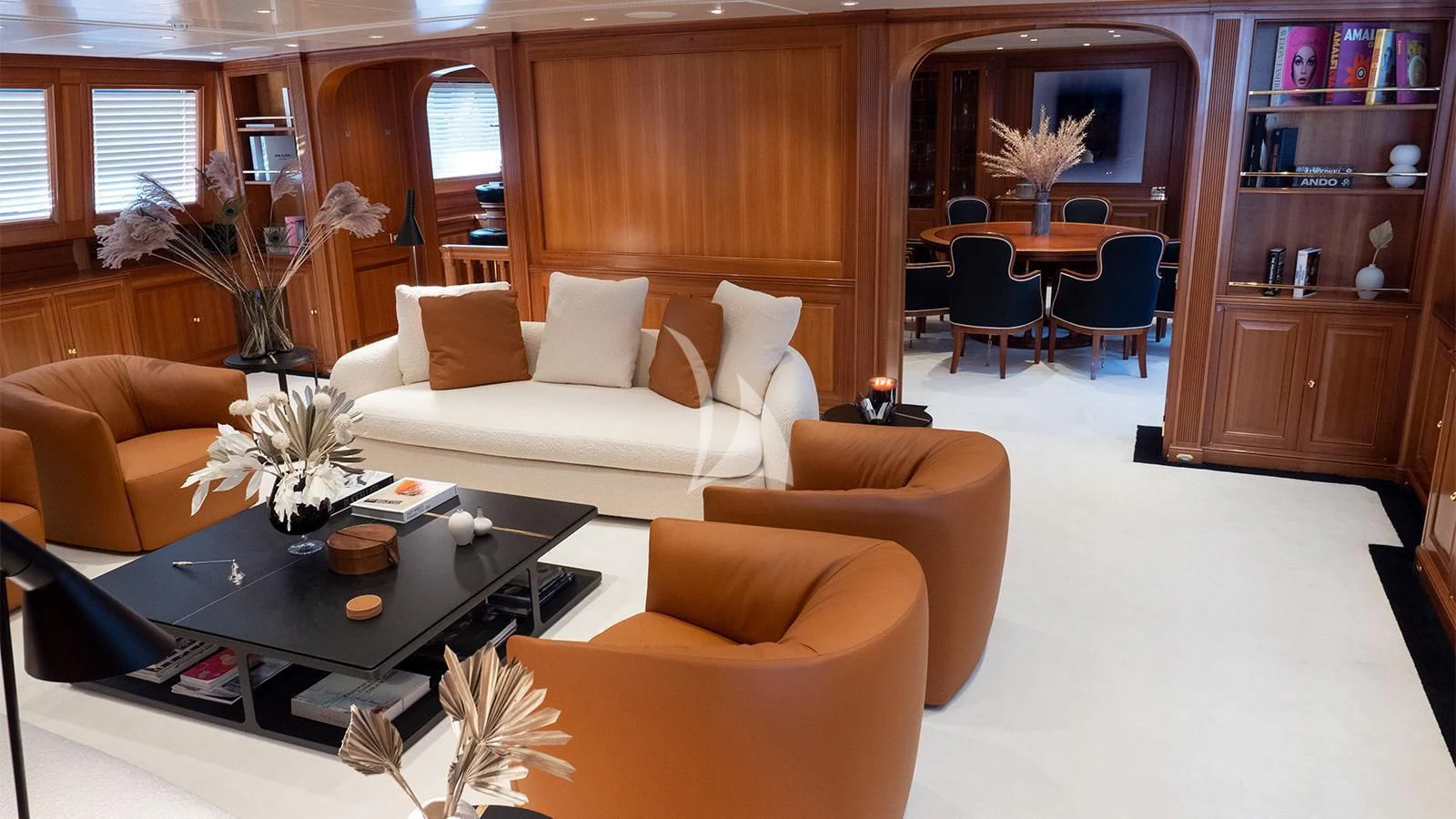 a living room with a couch and a coffee table aboard ALMYRA II Yacht for Charter